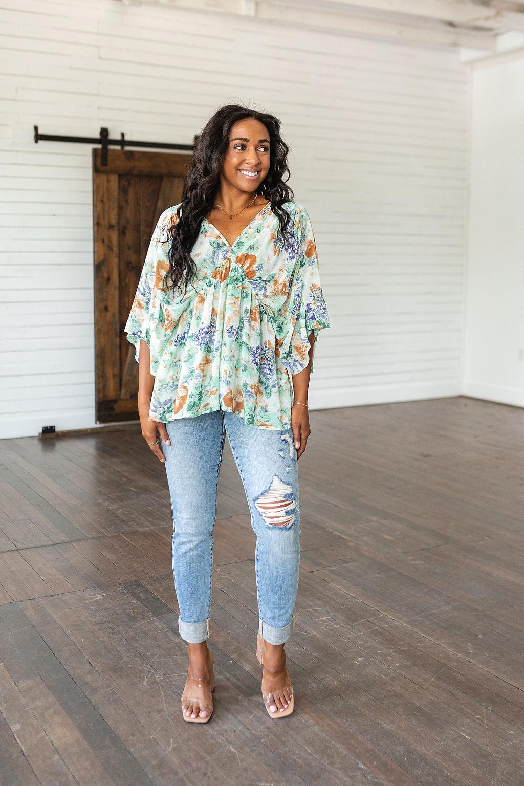 Fabled in Floral Draped Peplum Top in Ivory - Waverly Paige Boutique