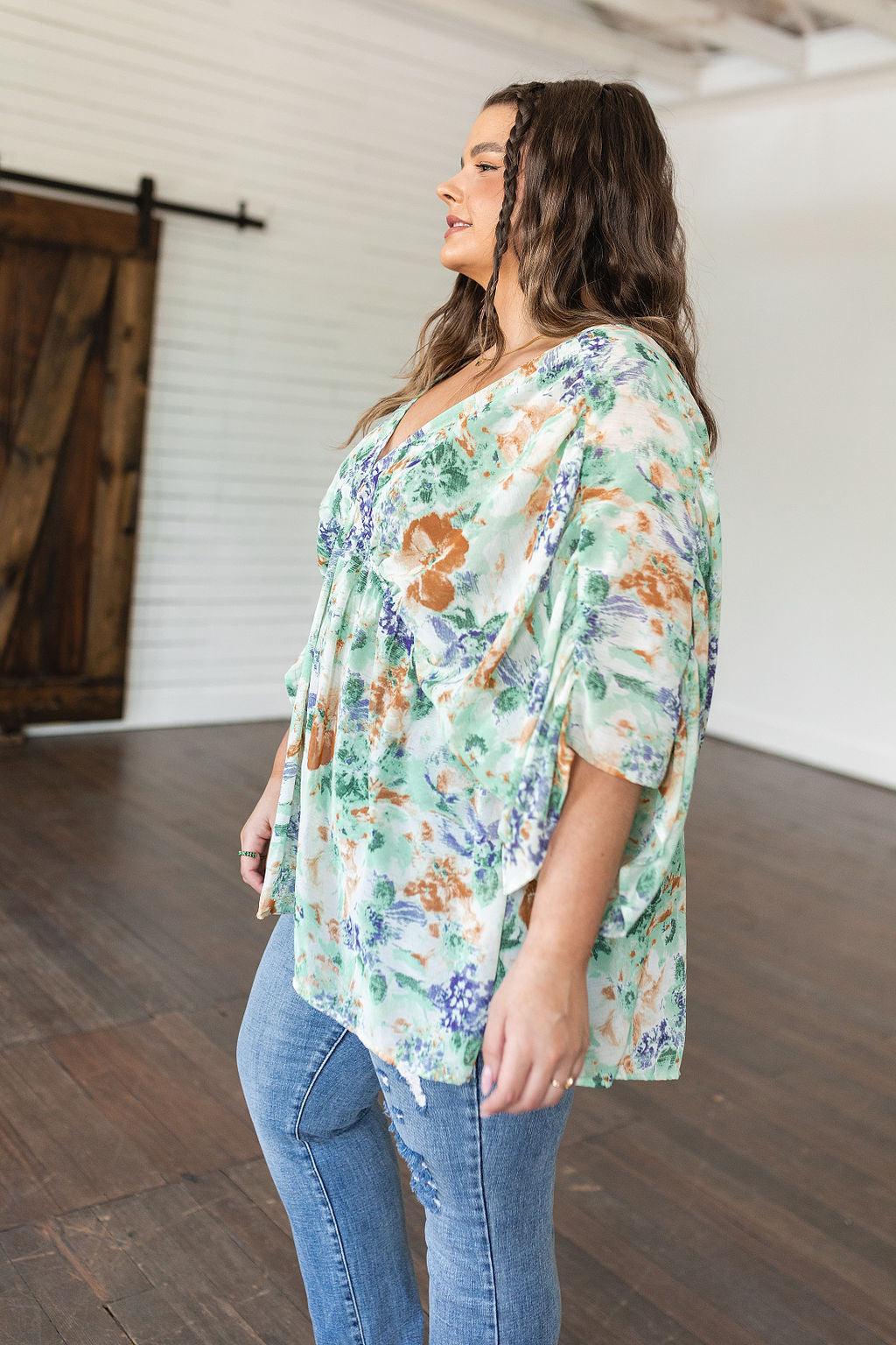 Fabled in Floral Draped Peplum Top in Ivory - Waverly Paige Boutique