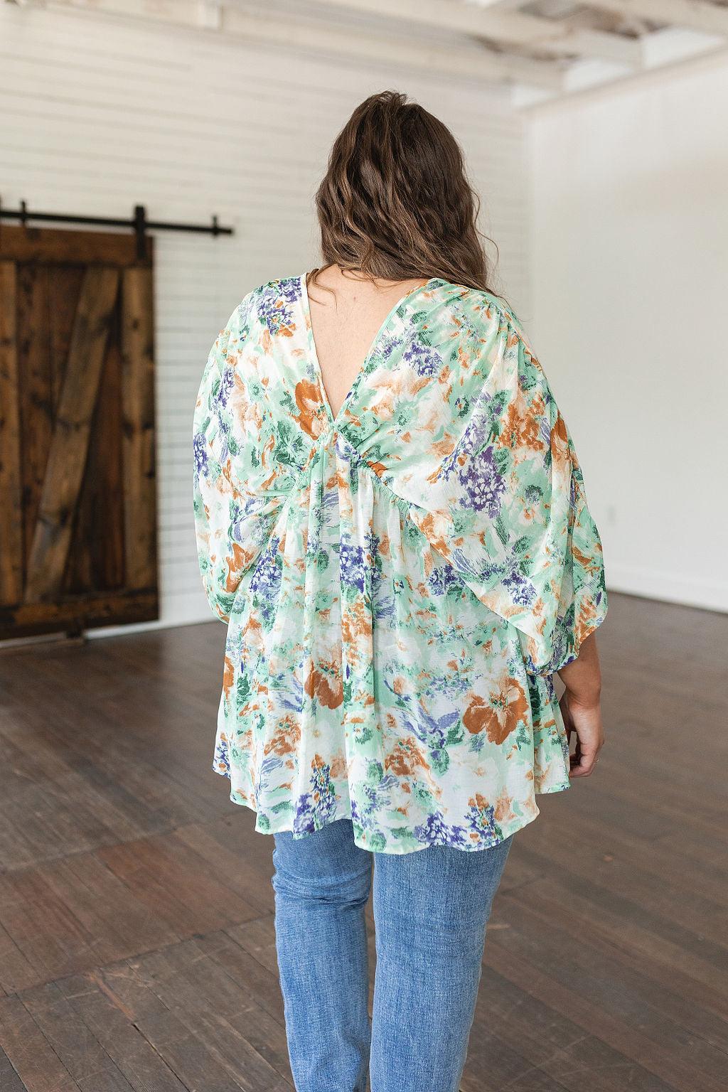 Fabled in Floral Draped Peplum Top in Ivory - Waverly Paige Boutique