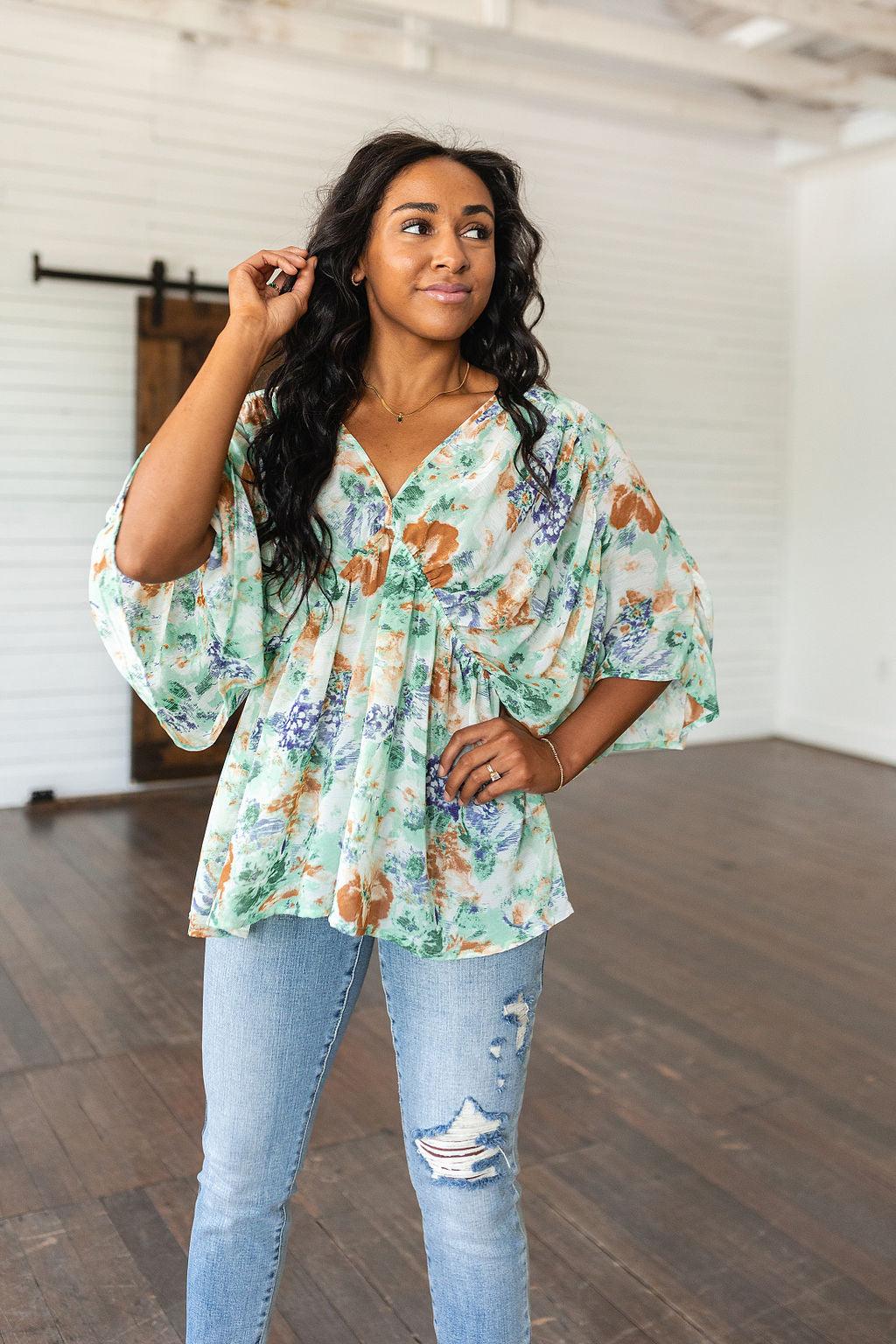 Fabled in Floral Draped Peplum Top in Ivory - Waverly Paige Boutique