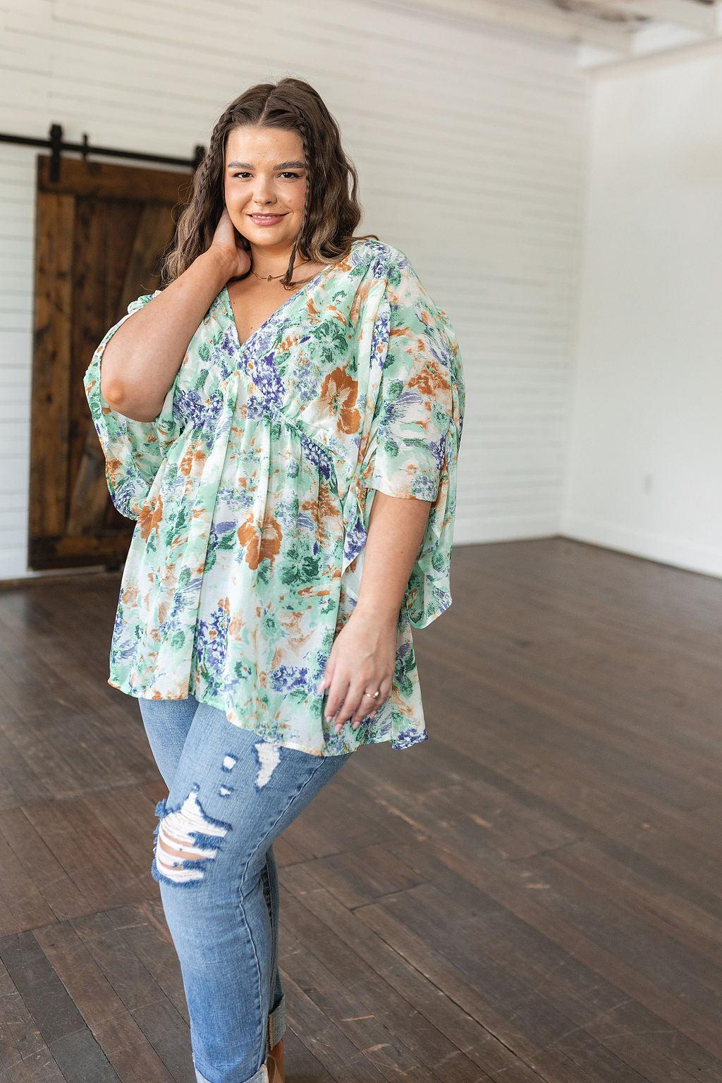 Fabled in Floral Draped Peplum Top in Ivory - Waverly Paige Boutique